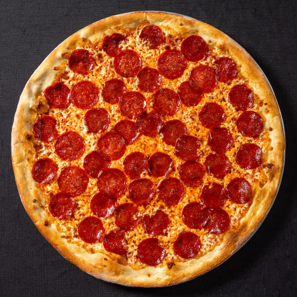 A whole pepperoni pizza from Vinnie's Pizzeria, with a golden crust and melted cheese.